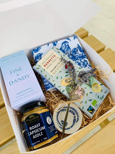 A gift box with tea, aioli, chocolate and more