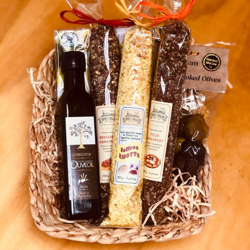 A gift basket with Italian rices, Olive Oil and ingredients